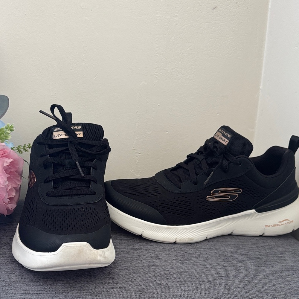 Skechers Black Athletic Slip-On Sneakers with White Sole and Rose Gold Accents